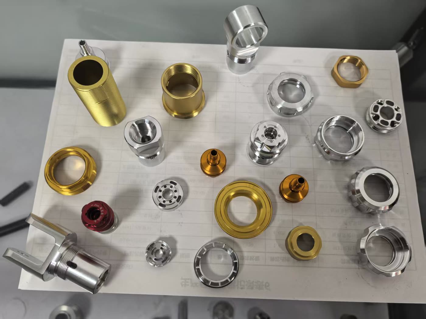 Anodized parts in gold, red and clear finishes
